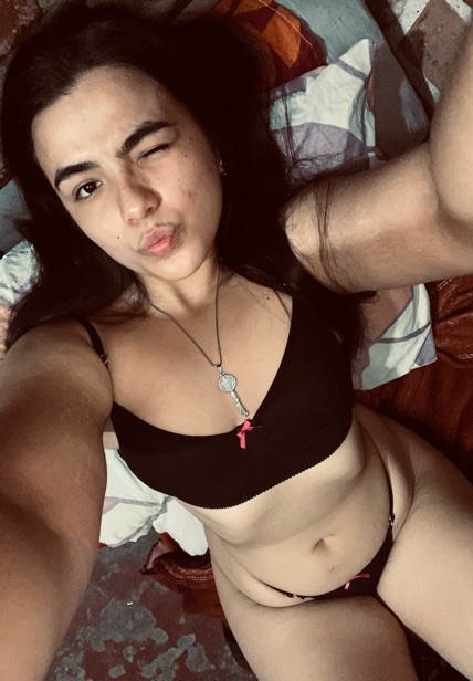 Adult woman with a playful expression during a video chat